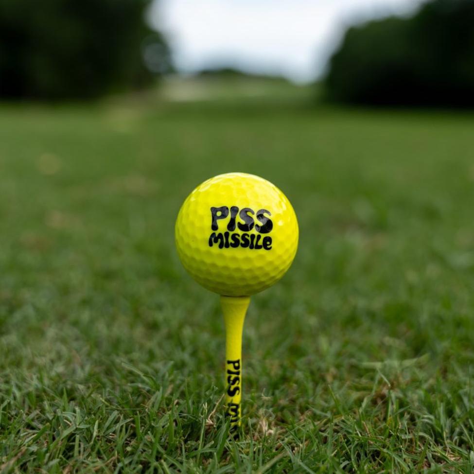 Piss Missile Golf Ball on a Driver Dart Golf Tee